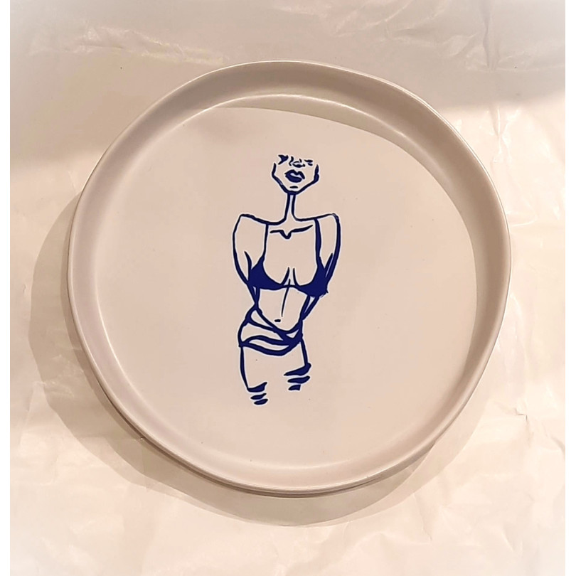 Unique stoneware platewith blue decor