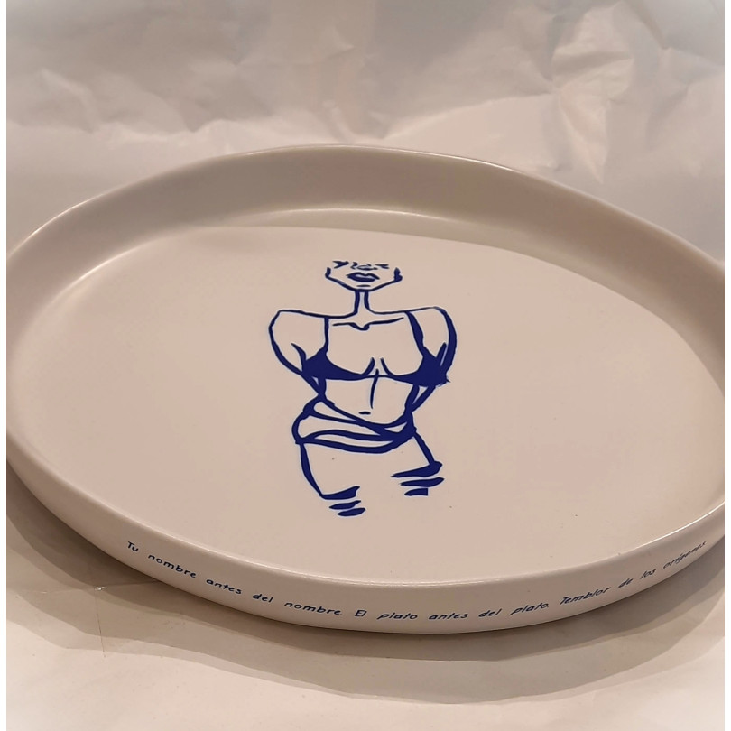 Unique stoneware platewith blue decor