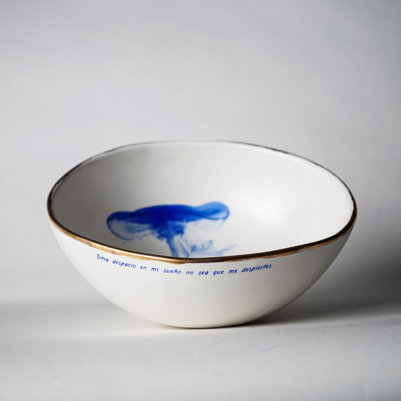 White bowl decorated with a blue jellyfish. Handcrafted ceramic from Barcelona