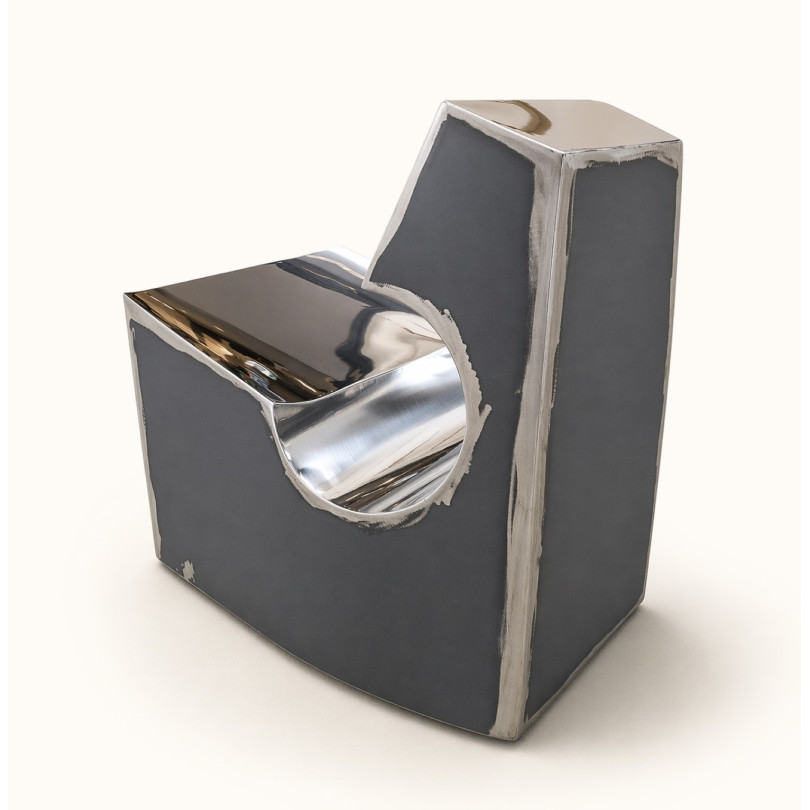 Contemporary low chair in stainless steel and black steel