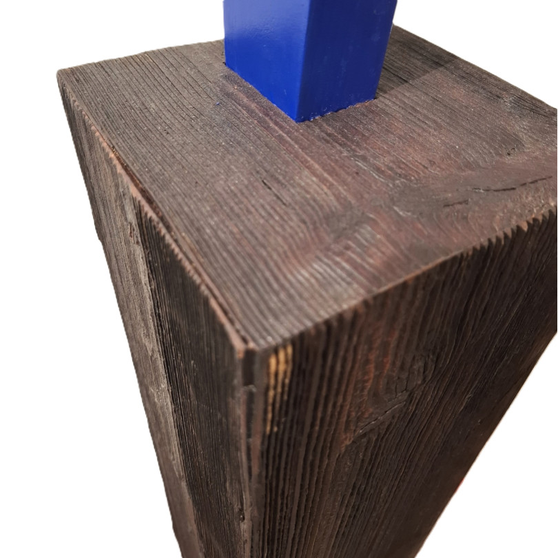 Geometric totem sculpture in lacquered wood with primary colors