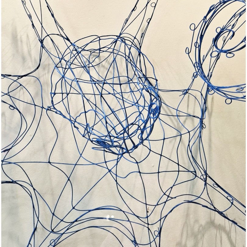Wall sculpture: blue octopus, made of blue lacquered wire