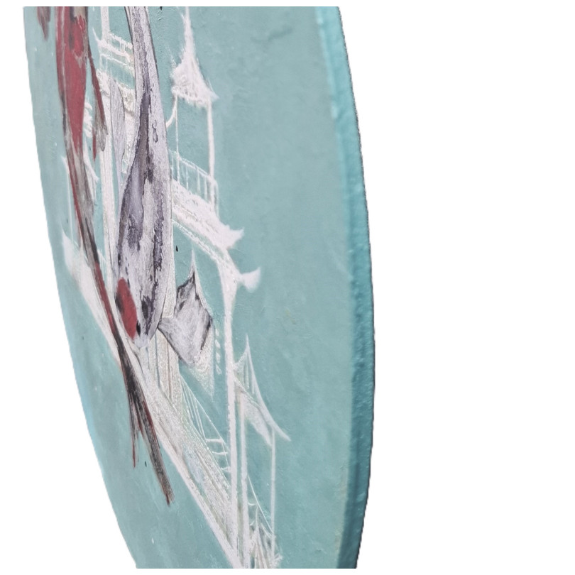 Small round painting depicting koi carp on a turquoise background.